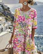 Elena | Abito midi floreale, ampio e leggero