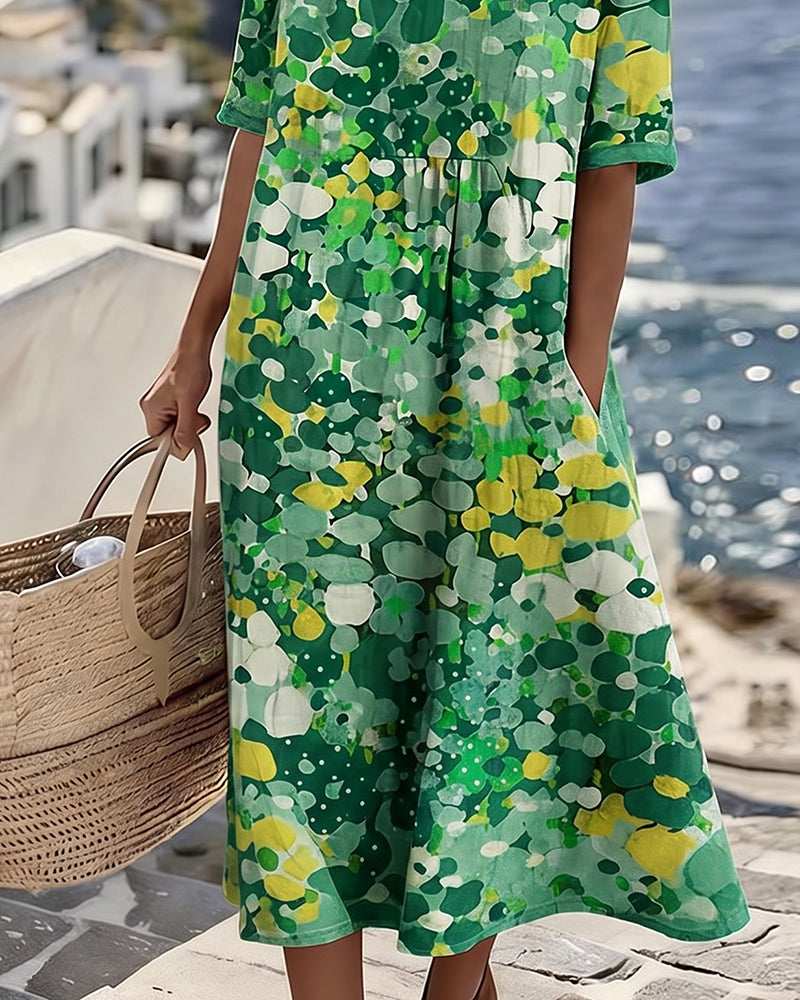 Elena | Abito midi floreale, ampio e leggero