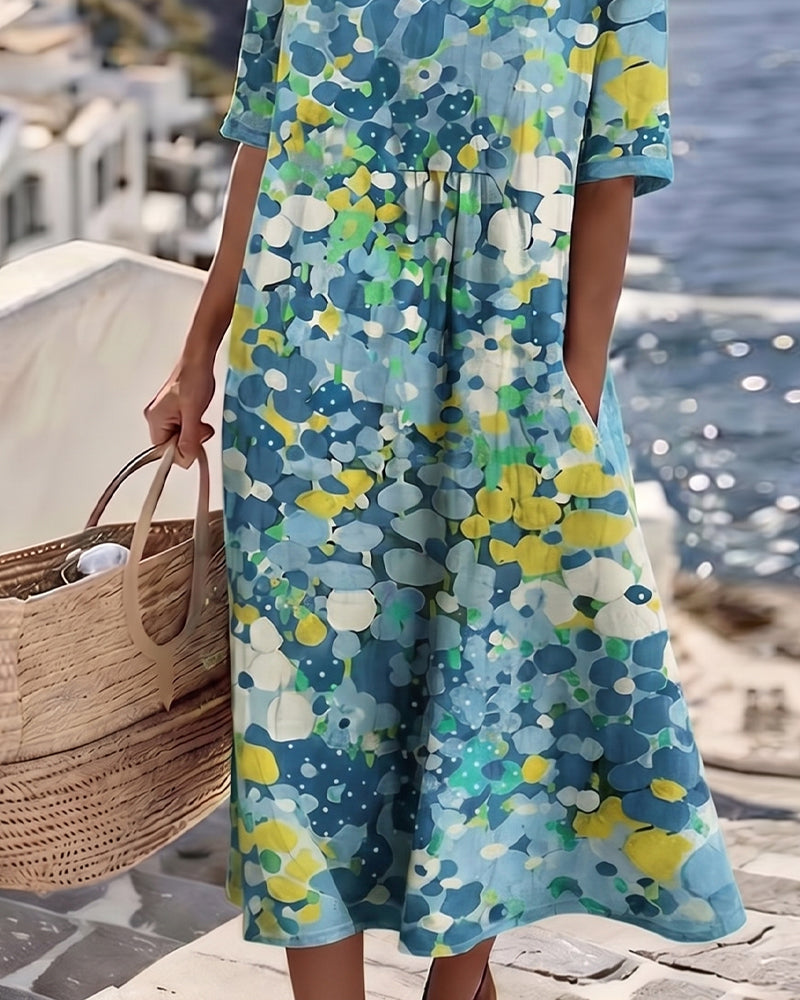 Elena | Abito midi floreale, ampio e leggero