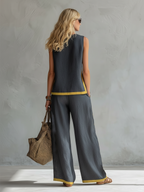 Leila - Elegante y casual conjunto de chaleco y pantalón de algodón y lino gris con ribete bicolor.