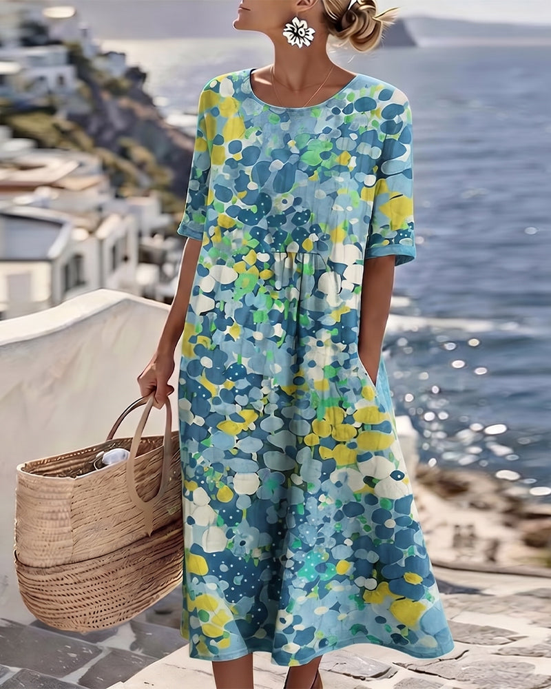 Elena | Abito midi floreale, ampio e leggero