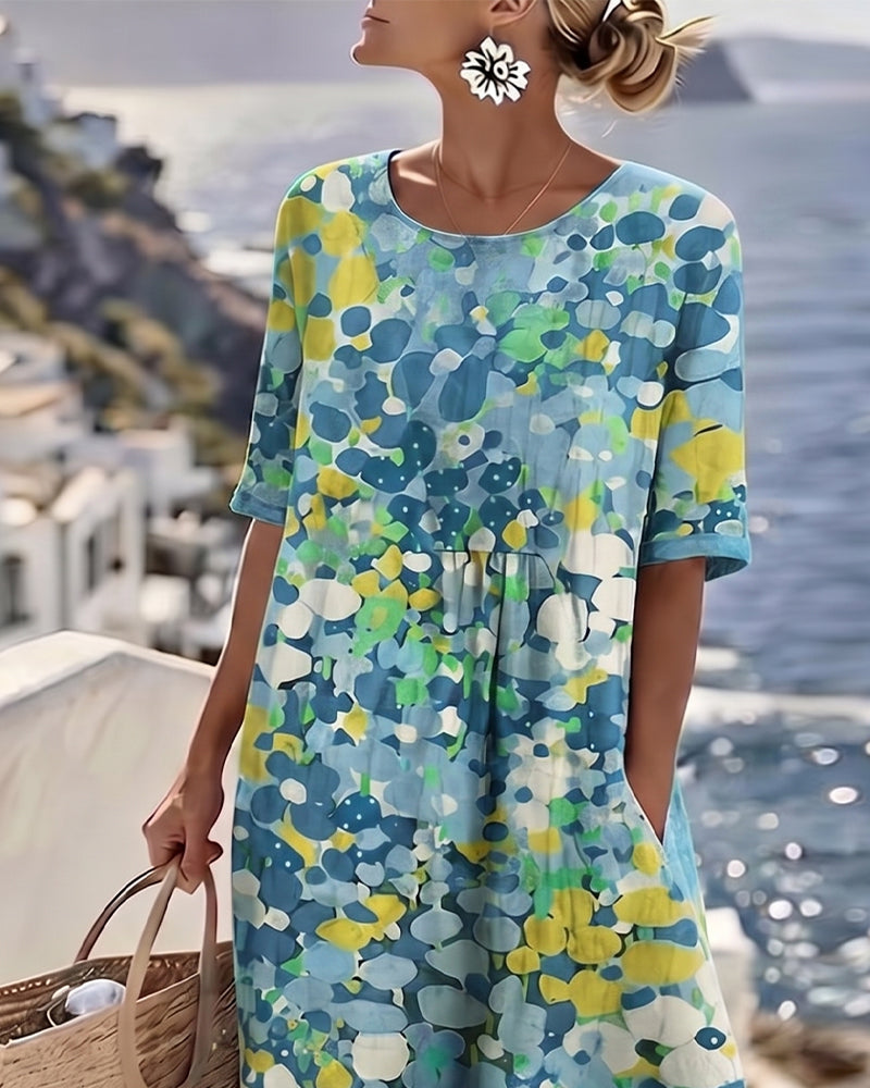Elena | Abito midi floreale, ampio e leggero